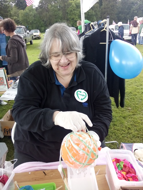 Freegle moderator Elaine showing demonstrating home made Christmas decorations