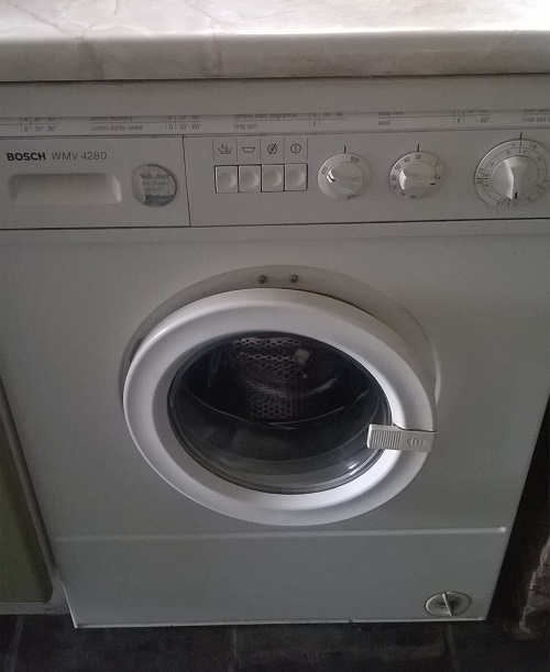 Our old washing machine that's still working